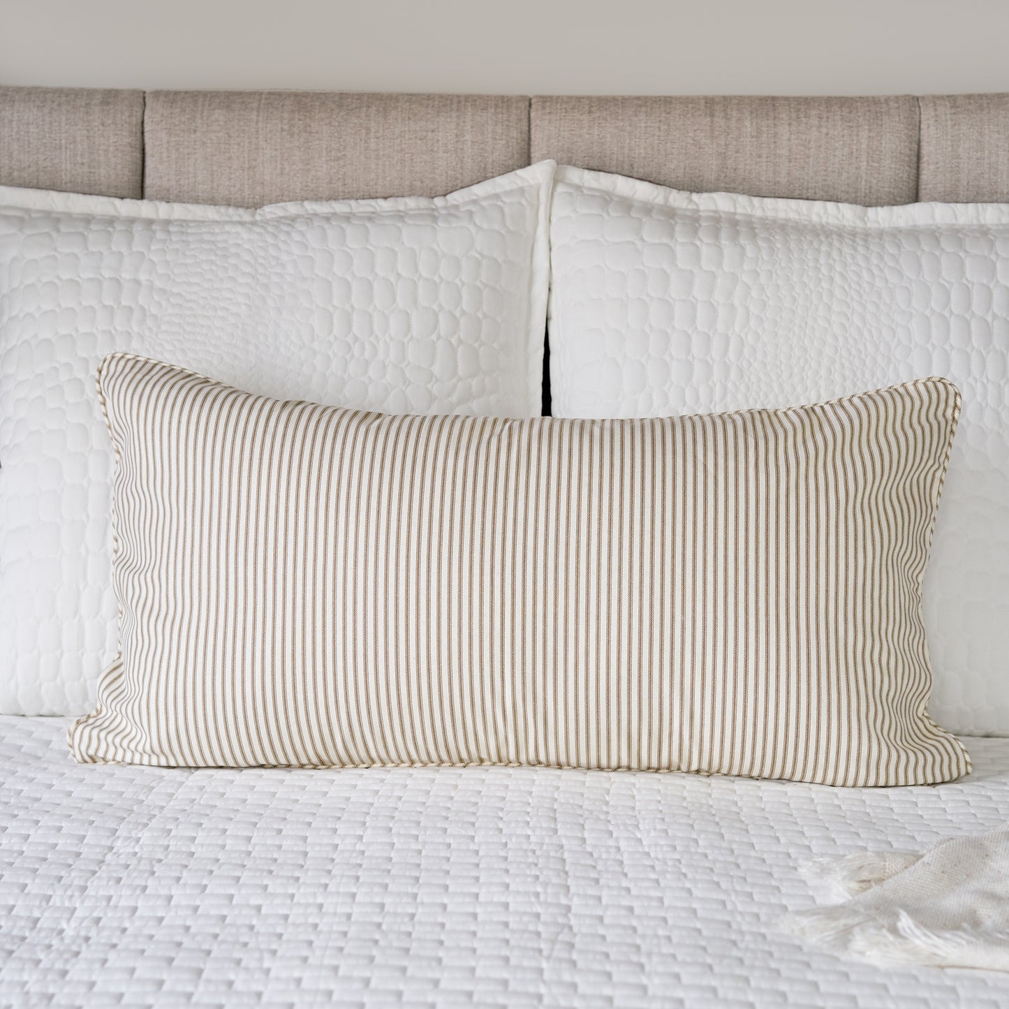 brown striped ticking pillow sham king size on bed